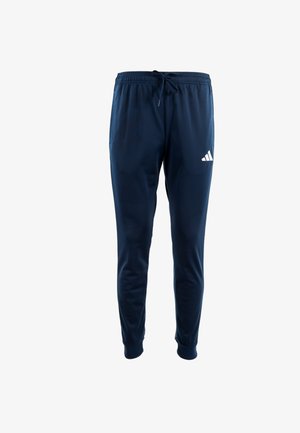 Pantalones deportivos azul marino hechos de tejido ligero, con una cinturilla elástica con cordón y un logo blanco en la parte inferior de la pierna izquierda.