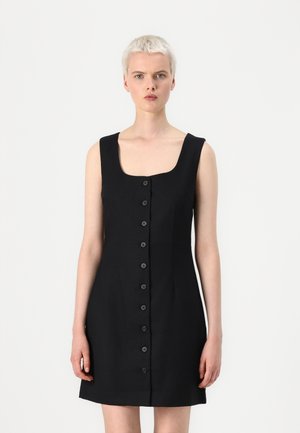 Black sleeveless dress featuring a square neckline and a button-down front, with a fitted bodice and flared skirt. Smooth texture, minimalist design.