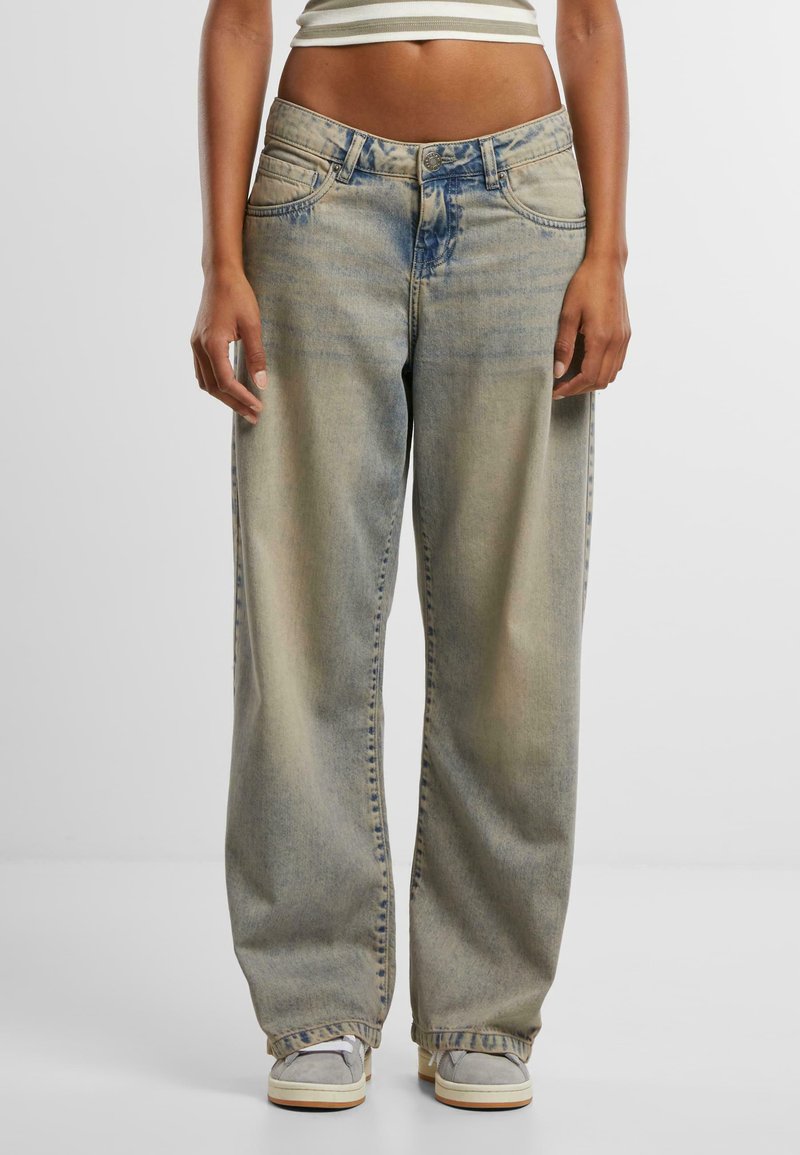 Light blue wide-leg jeans made of denim, featuring a faded wash, five-pocket design, and visible stitching along the seams.