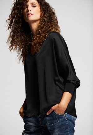 CHARMING - Bluse - black