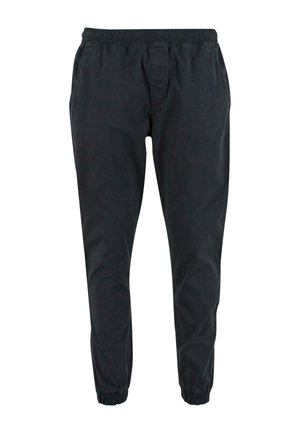 Svarte joggebukser laget av et lett stoff, med elastisk midjebånd, sidelommer og innsnevrende mansjetter ved anklene.