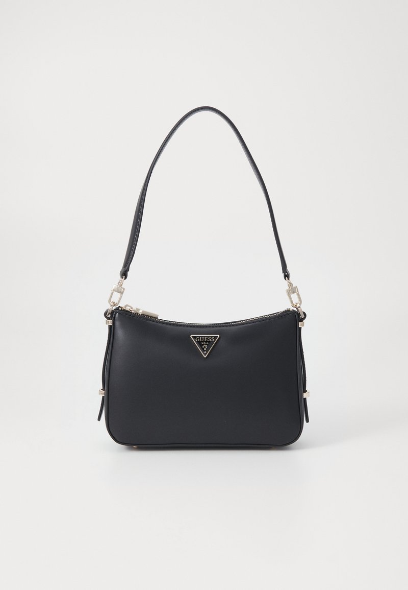 Black synthetic handbag with a rounded shape, featuring a front logo plate, zip closure, and a single shoulder strap. Silver-tone hardware accents.