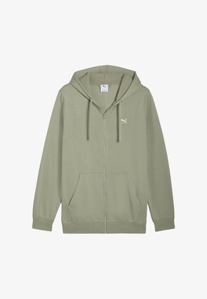 Veste zippée verte en tissu doux, avec une poche kangourou, une capuche ajustable et un petit logo sur la poitrine.