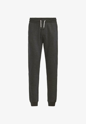 Hallid hallid dressipüksid, millel on elastne vöökoht, reguleeritav nöör ja mansettidega pahkluud. Valmistatud pehmest kangast, millel on peen tekstuur.