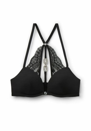 Soutien-gorge noir avec une superposition en dentelle, bretelles ajustables, un design en V et un accent en métal argenté décoratif au centre.