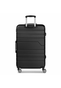 Valigia rigida nera con design elegante, scanalature orizzontali, manico telescopico argentato e quattro ruote per la mobilità.