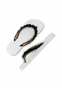 Witte flip-flops met gestructureerde zolen; zwart en gouden kralenbanden, met een gladde afwerking en een veilige pasvorm.