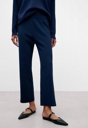 Spodnie materiałowe