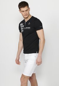 Koroshi Apdrukāts T-krekls - black
