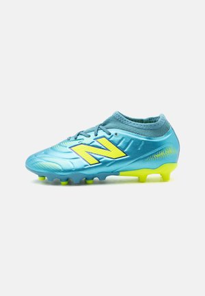New Balance, TEKELA TEAM LOW LACED JNR FG V5 UNISEX - Chaussures de football pour terrain sec - metallic blue/alkaline green