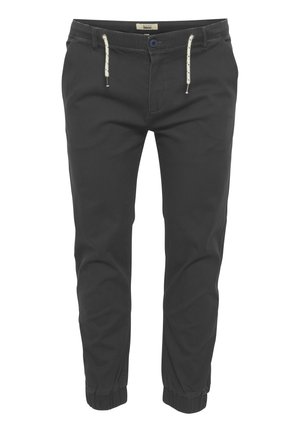 Svarta joggers i bomull med elastisk midja, justerbar dragsko och ribbade muddars. Enkel design utan mönster.