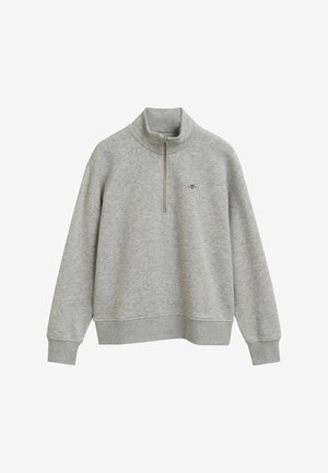 Lichtgrijze fleece sweatshirt met kwart ritssluiting. Kenmerkt zich door een staande kraag, ribgebreide manchetten en zoom, met een klein logo-accent op de borst.