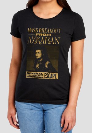 Black t-shirt with vintage-style print showing a woman's face and text "Mass Breakout from Azkaban" and "Several High-Security Prisoners Escape."