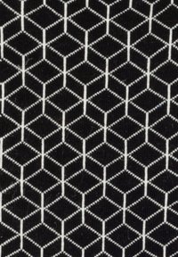 Tela geométrica con un fondo negro y un patrón hexagonal blanco, que muestra una superficie texturada y de punto.