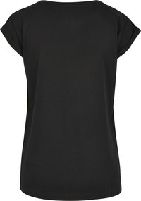Top nero a maniche corte con vestibilità rilassata, realizzato in un tessuto morbido e liscio, con scollatura tonda. Design semplice senza motivi visibili.