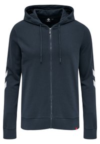 Marineblå zip-hoodie med dragsko i huvan, ribbmuddar vid ärmar och nederkant, med vita chevronmönster på ärmarna. Material i bomullsblandning.