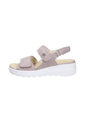 Sandale mauve clair à bout ouvert avec deux brides ajustables et une semelle épaisse blanche, conçue pour le confort et un port décontracté.