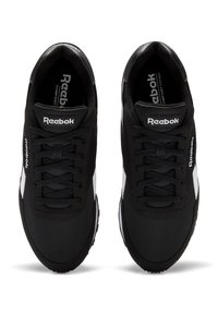 Zapatillas deportivas negras con tejido texturizado, con cordones negros, una franja blanca y una plantilla acolchada. Logo de Reebok en la lengüeta y en el lateral.