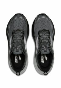 Gray running shoes with a mesh upper, featuring black laces, reflective accents, and padded collars. Rubber outsole with patterned tread.