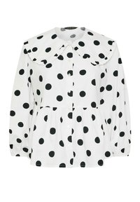 Camicia bianca con grandi pois neri, dotata di colletto Peter Pan, chiusura con bottoni frontale e vita arricciata con maniche lunghe.