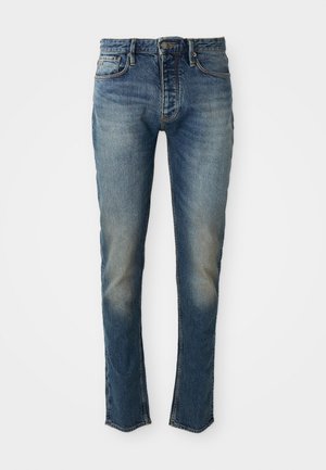 Blaue Jeans aus Denim mit geradem Schnitt, gewaschener Optik, Fünf-Taschen-Design, kontrastierenden Nähten und Metallbeschlägen an der Taille.