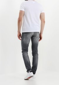 Tommy Hilfiger Triko s potiskem - white