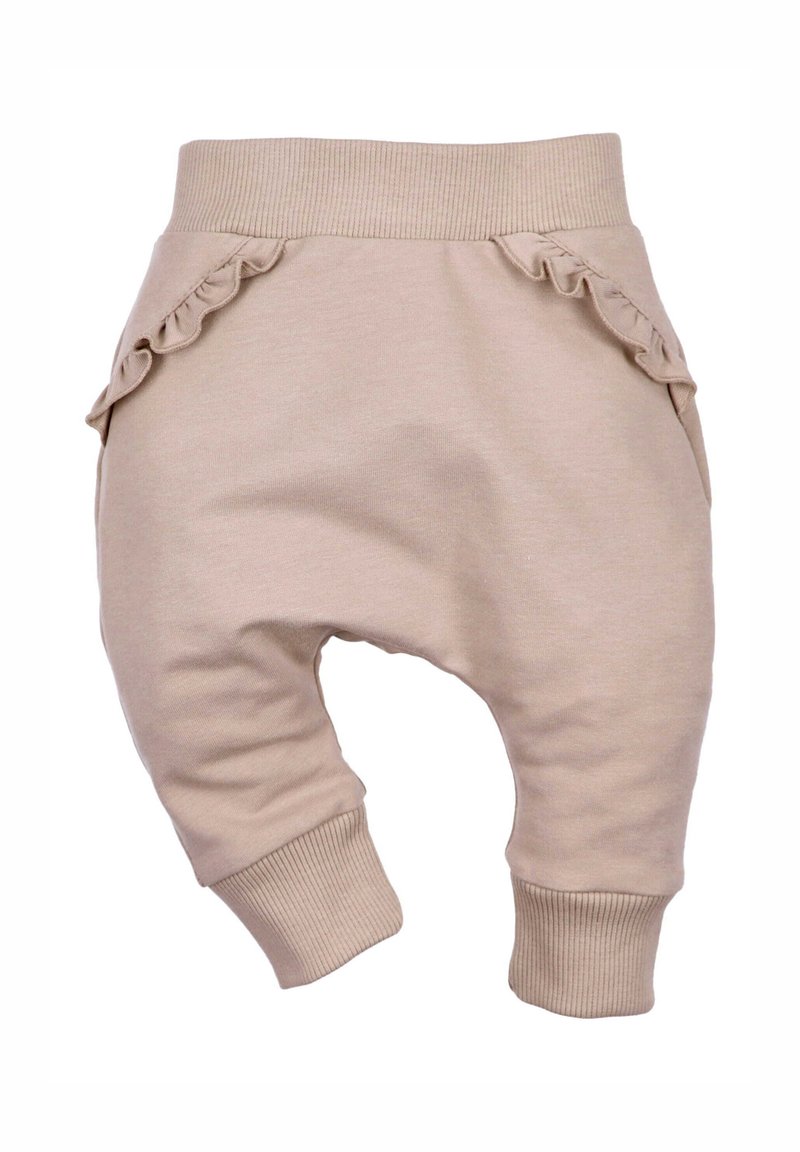 Beige Baumwoll-Haremhosen mit geripptem Bund und Bündchen, ausgestattet mit Rüschendetails an den Seitentaschen für zusätzlichen Textur- und Designinteresse.