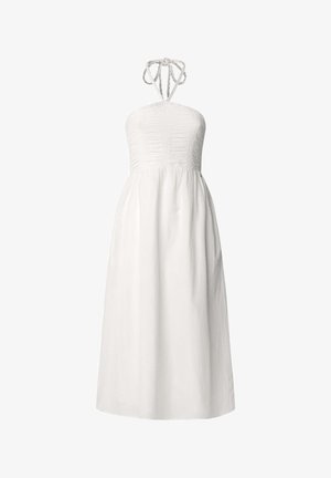 Robe blanche sans manches avec un corsage smocké et des liens autour du cou. Jupe fluide, mi-longue en tissu doux et texturé.