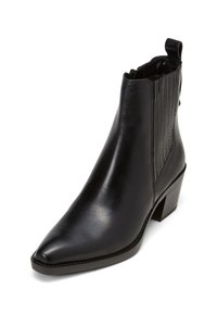 Black leather ankle boot with a pointed toe, textured side panels, elastic accents, and a chunky heel. Smooth surface with subtle shine.