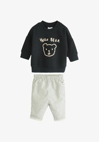 Valitud, black white bear