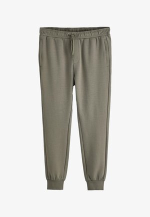 Pantalon de jogging vert olive avec taille élastique, cordon, poches latérales et chevilles resserrées, présenté sur fond blanc.