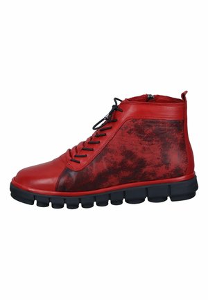 Red leather high-top sneaker with textured design, black accents, ribbed sole, and black laces. Zippered back for easy wear.