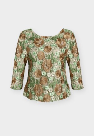 Sheer beige blouse with brown and green floral embroidery, boat neckline, and three-quarter sleeves.