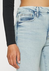 Good American Skinny džíny - light-blue denim