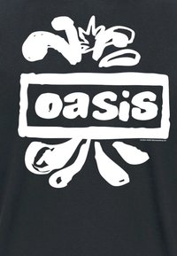 Bold white "oasis" text in block letters surrounded by abstract shapes on a black background, resembling a stylized burst design.