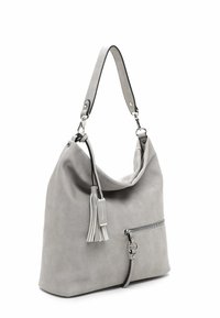 Sac hobo en simili cuir gris avec un design décontracté, une poche zippée à l'avant et un détail de frange décoratif sur la sangle.