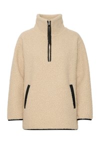 Beige fleece-pullover med høj krave, halv lynlås foran og sorte sidelommer. Blød tekstur med en let oversized pasform.