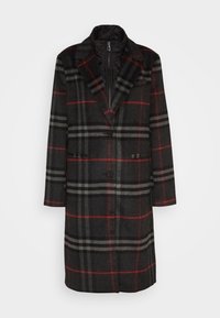 Abrigo largo de cuadros en gris oscuro con rayas rojas y gris claro, dos botones y una capa interior acolchada negra con cremallera.