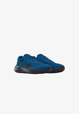 Coppia di scarpe da ginnastica blu con suole nere e logo Reebok nero sui lati, leggermente inclinate verso destra su sfondo bianco.