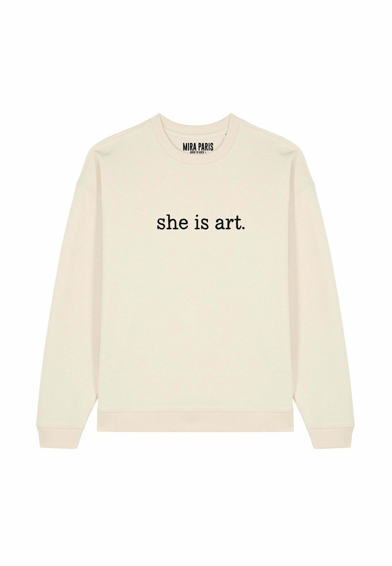 Felpa girocollo color crema con testo nero "she is art." centrato sul davanti e una piccola etichetta "MIRA PARIS" all'interno del colletto.