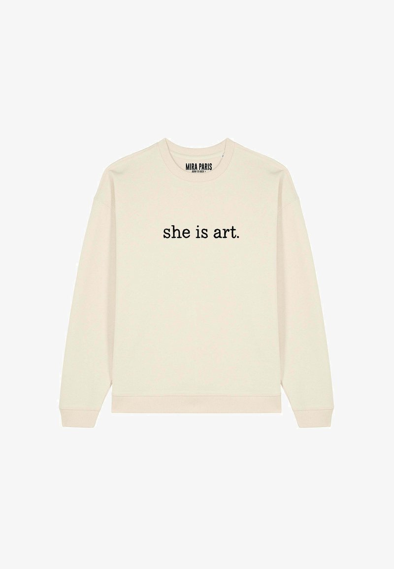 Felpa girocollo color crema con testo nero "she is art." centrato sul davanti e una piccola etichetta "MIRA PARIS" all'interno del colletto.