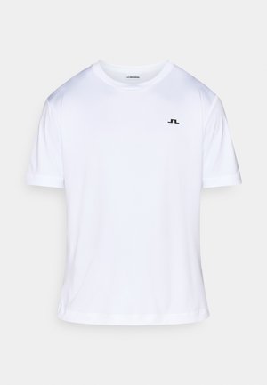 Tricou alb cu mâneci scurte din bumbac, cu decolteu rotund și un mic logo negru pe pieptul stâng. Textură fină a țesăturii.