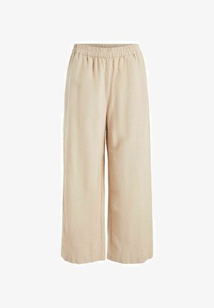 Beige vide bukser lavet af letvægtsstof. Har en elastisk talje og løs pasform, hvilket giver komfort og åndbarhed.