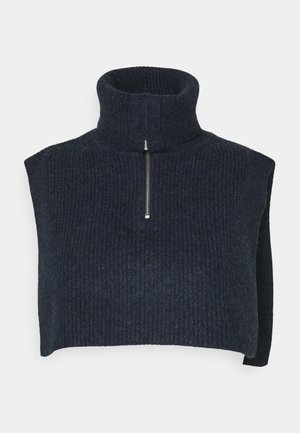 Donkergrijze geribbelde gebreide mouwloze coltrui met een korte ritssluiting aan de voorkant en brede schouderbedekking.