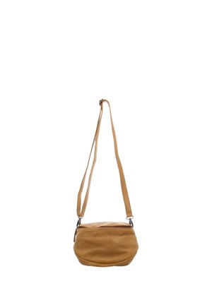 Small tan leather shoulder bag with long adjustable strap and a zipper closure on top, isolated on white background.