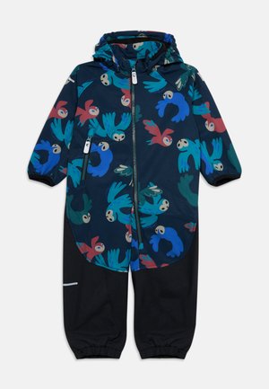 Combinaison à capuche pour enfants avec motifs d'oiseaux bleus, rouges et verts sur la partie supérieure et jambes noires unies avec poignets élastiques.