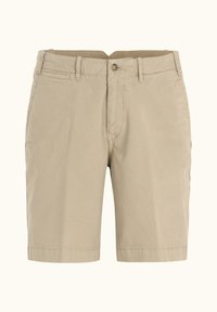 Pantaloni corsari beige in cotone con parte frontale piatta, due tasche laterali e chiusura a bottone. Taglio dritto con dettagli di cucitura minimi.