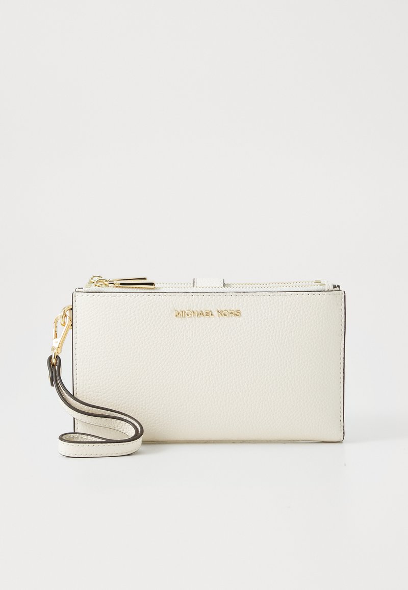 White pebbled leather wallet with gold hardware, top zipper, and detachable wrist strap. Features embossed logo on front.