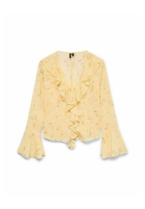 Geltona blusa su raukšlėtu priekiu, ilgomis varpo formos rankovėmis ir gėlių raštu su žaliais akcentais. Lengvas, pusiau permatomas audinys.