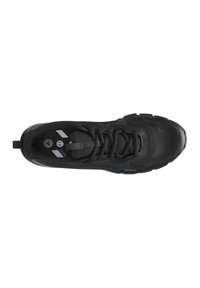 Schwarzer Sportschuhe mit einem Obermaterial aus Mesh, runder Zehenpartie und dicker Gummisohle. Verfügt über flache Schnürsenkel und Logo-Details an der Seite und der Zunge.